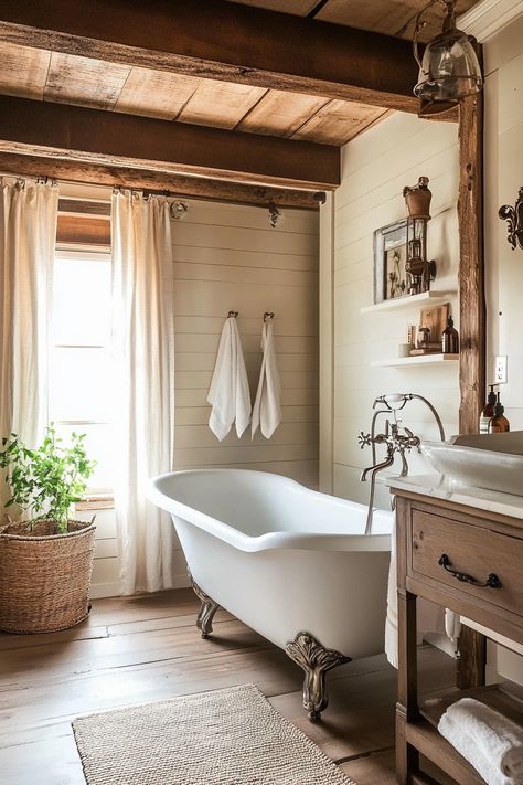 Discover warm and inviting modern bathroom ideas with a rustic touch! This serene space features a clawfoot tub, natural wood accents, and soft lighting for the perfect blend of cozy and contemporary. #BathroomDesign #ModernRustic #HomeDecor Bathroom With Clawfoot Tub Ideas, Clawfoot Tub Ideas, Bathroom With Clawfoot Tub, Rustic Meets Modern, Luxury On A Budget, Natural Wood Accents, Affordable Farmhouse, Modern Bathroom Ideas, Farmhouse Bathroom Ideas