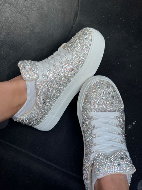 White and silver women’s rhinestone sneakers with a small platform Sparkle Sneakers Wedding, Sparkly Wedding Sneakers, Sneakers For Prom, Kourtney Wedding, Prom Sneakers, Trip Fits, Sparkly Sneakers, Bride Sneakers, Rhinestone Sneakers