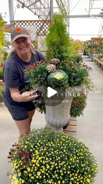 VANDULA FARMS on Instagram: "Elevate your patio with a stunning English urn filled with beautiful ornamental plants! 🤗 🍂 Easy to create and sure to make an impact, this timeless yet elegant container will wow your guests this Autumn season and beyond! 🎃  Follow along for container recipe: 👇✨  1Gal Thuga Occidentalis 'Jantar' 4" Chrysathemums 'Rust' x 3 4" Ornamental Cabbage x 3  4" Muehlenbeckia x 3 2 Faux Botanical Stems (optional)  16" Wickford Urn   #autumndecor #patioperfection #englishgarden #containergardening #fallplanting #vancity #vancouverisawesome #yvrlife #vancouverbc #deltabc #surreybc #richmondbc #burnabybc #coquitlambc #northvancouver #downtownvancouver #ubcvancouver" Ornamental Cabbage Planter Fall, Fall Container Ideas, Fall Urns For Front Porch, Porch Urns, Fall Urn, Fall Container Plants, Fall Flower Pots, Winter Containers, Fall Pots