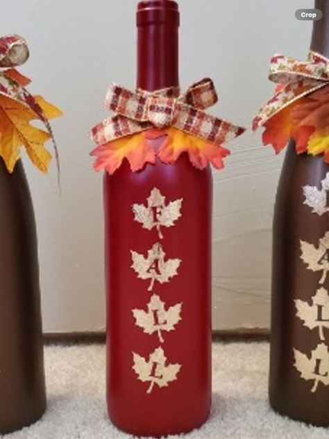 Fall Wine Bottle with fairy lights Fall Bottle Crafts, Cricut Wine Bottle Ideas, Recycle Wine Bottles, Wine Bottle With Fairy Lights, Fall Wine Bottle, Thanksgiving Wine Bottle, Halloween Comics, Lighted Bottles, Fall Wine Bottles