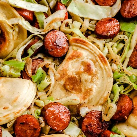 Fried Cabbage and Sausage Skillet with Pierogis Pierogi Cabbage And Sausage, Pierogies Cabbage And Kielbasa, Pierogies And Cabbage, Cabbage Perogies Sausage, Cabbage And Perogies, Kielbasa Cabbage And Pierogies, Cabbage And Pierogies, Pierogies And Sausage Recipes, Kelbeisa Sausage And Cabbage