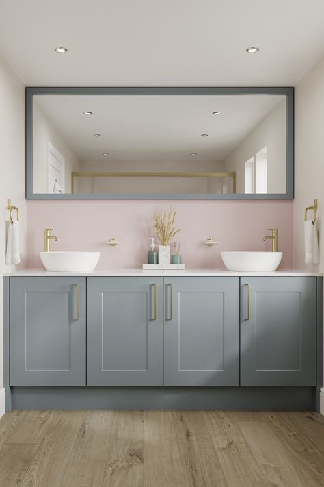 This Chelford Dusk Blue Bathroom is a great place to look for blue bathroom ideas or shaker bathroom ideas. Its shaker cabinet design with brass cabinet handles is an easy way to create a modern bathroom design. Add a white compact laminate countertop and finish with a light bathroom wall to tie it all together. Howdens Bathroom Cabinets, Ensuite Bathroom Ideas Blue, Blue Unit Bathroom Ideas, Couple Bathroom Ideas, Couples Bathroom Ideas, Bathroom Vanity Cupboards, Bathroom Cupboard Ideas, Pink Bathroom Sink Unit, Shaker Bathroom