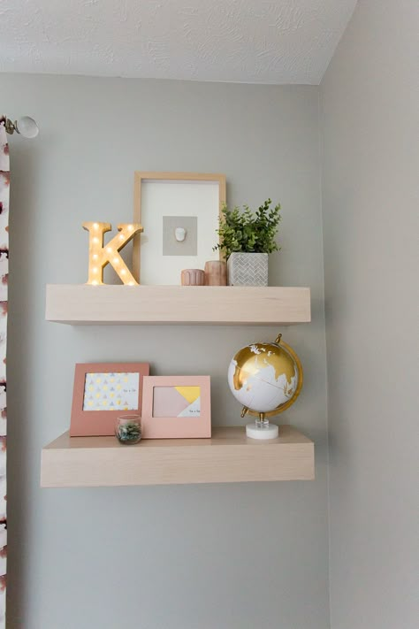 Floating shelves. Pink accessories. Teen girl's room. Fluff Interior Design - Decorating for REAL life! Omaha, NE. Teenage Shelf Decor, Floating Shelves Bedroom For Bags, White Floating Shelf Decor Bedroom, Cute Shelves For Bedroom, Cute Shelf Ideas Bedrooms, Preppy Floating Shelves, Floating Shelves Teen Girl Bedroom, Bedroom Wall Decor Above Bed Teen Girls Room Ideas, Floating Shelves In Kids Room