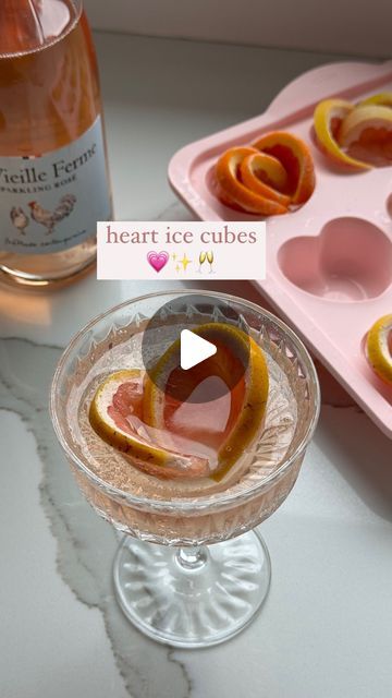 Nicolle | Cheese, Wine, Easy Appetizers & Recipes on Instagram: "DETAILS HERE ⬇️✨ Spice up your drinks this Valentines or Galentines day with citrus heart ice cubes! 🧊🥂💗 they not only look pretty but add a nice light citrus flavor to your drink! 🍊 What you’ll need: 🥂 silicone heart mold 🥂 a grapefruit or orange 🥂 sparkling rosé or Prosecco Cut your grapefruit into slices and put them on the outer sides of each heart ice mold to resemble a heart. Add some water and freeze over night. Add the ice cubes to a glass and fill with your bubbly of choice! 🍾🥂💗 SAVE this for Valentine’s Day and follow along for more 🥂💗✨ • • #huffposttaste #tastingtable #foodie #foodstyling #eeeeeats #wineandcheese #foodandwine #eastcoastfoodies #entertainingathome #onthetable #dinnerparty #easyappetizers Grapefruit Ice Cubes, Valentines Ice Cubes, Heart Ice Cubes, Pretty Ice Cubes, Heart Shaped Ice Cubes, Flavored Ice Cubes Cocktails, Food Pin, Tasting Table, Alcohol Drink Recipes