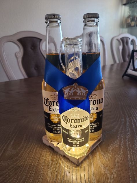 Beer Bottle Centerpieces For Men, Diy Beer Centerpieces For Men, Centerpiece With Beer Bottles, Beer Centerpieces For Men, Modelo Beer Theme Party, Rustic Beer Bottle Centerpieces, Beer Centerpieces, Corona Beer Party Theme, Beer Party Decorations