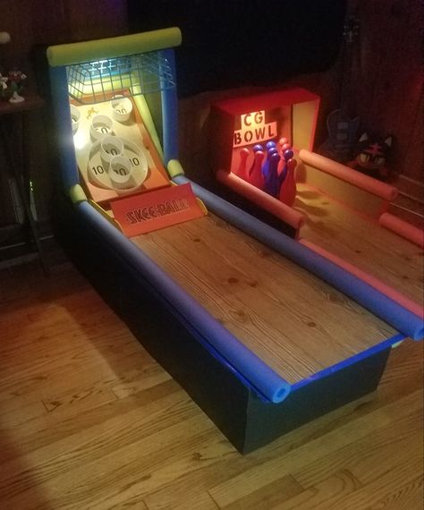 Bought a skee ball game off of Amazon but wanted it to have more of the classic arcade version feel. Arcade Bday Party, Arcade Theme Trunk Or Treat, Arcade Trunk Or Treat, Arcade Decorations Party Ideas, Diy Arcade Games, Ball Pit Games, Diy Ball Pit, Arcade Games Diy, Arcade Theme