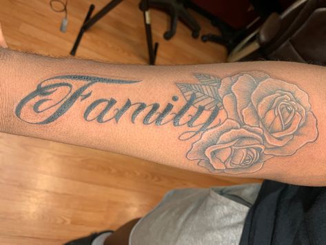 Forearm tattoo with family and roses Family Tattoo Ideas For Men And Women, Family Forearm Tattoos For Women, Men’s Family Tattoo Ideas, Family Tattoos With Roses, Family And Roses Tattoo Design, Men’s Forearm Tattoo Ideas Family, Forearm Tattoo Men Sleeve Family, Rose Tattoo With Family As Stem, Family Tattoos Forearm