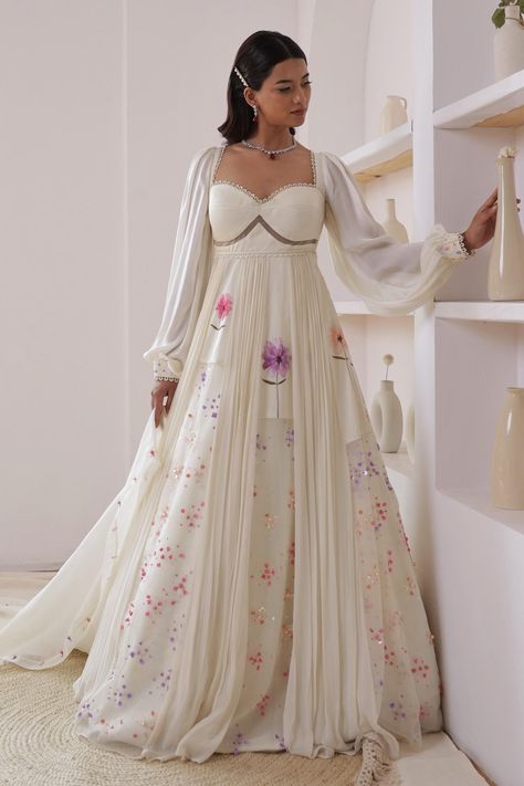 Ivory panelled anarkali with floral print and sequin, bead embroidery. Paired with dupatta. Component: 2 Pattern: Printed, Embroidery Type Of Work: Floral, sequin, bead Neckline: Sweetheart Sleeve Type: Balloon sleeves Fabric: Georgette, Organza Color: Ivory Other Details: Sheer panelled back Occasion: Sangeet - Aza Fashions Maternity Indian Outfits, Anarkali With Dupatta, Printed Embroidery, Lehenga Designs Simple, Anarkali Dress Pattern, Traditional Indian Dress, Fashion Top Outfits, Indian Dresses Traditional, Gown Pattern