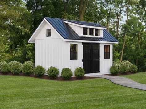 Board And Batten Siding White And Black, Authentic Farmhouse Exterior, Metal Roof Shed Ideas, Board And Batten Shed Ideas, White And Black Shed Exterior, Shed With Metal Roof, White Shed With Black Trim, White And Black Shed, Shed Next To House