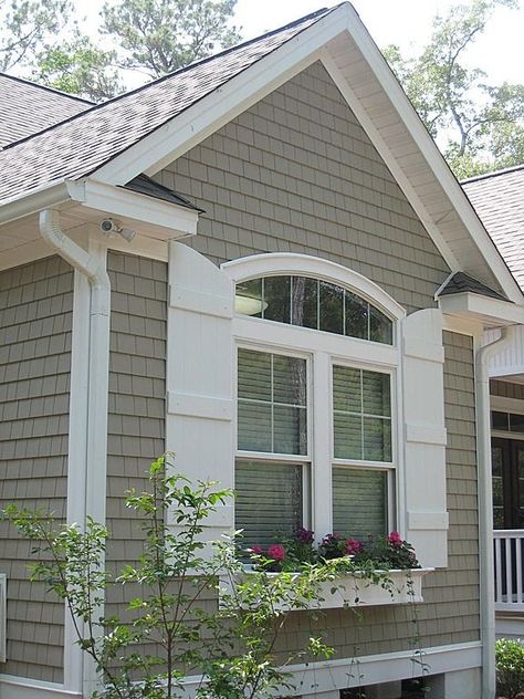 Home Improvement Archives | Cottage exterior, House shutters, Cottage house exterior Shutters On Arched Windows Exterior, Cottage Style Shutters, Taupe Cottage Exterior, Garage Front House, White Home Exterior, Cottage House Exterior, Shake Shingle, White Shutters, Cottage Exteriors