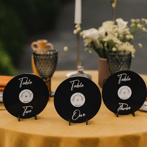 🍴Presenting you a perfect combo to organize the seating of your dear guests! Retro vinyl records table numbers along with matching seating chart will keep the vintage spirit of your party in one style. With clear printing, it conveniently guides guests to their seats, enhancing  the organization of your event. It combines practicality with elegance, making seating arrangements effortless for weddings, birthdays, and other special occasions.  Table numbers can not only be a functional element in Vinyl Wedding Table Numbers, Album Cover Table Numbers, Vinyl Records Wedding, Music Table Numbers, Record Theme Wedding, Wedding Seating Chart Records, The 1975 Wedding, Record Table Numbers Wedding, Records Seating Chart