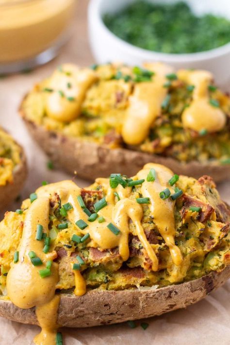 These Vegan Twice Baked Potatoes are simple enough to enjoy with your weeknight meals, and fancy enough to impress your guests! You'll absolutely love these absolutely delicious potatoes! Filled with broccoli, vegan ham, and vegan cheese sauce, they're dairy free and oil free, and full of plant based nutrition. Potatoes With Ham, Vegan Ham, Ham And Broccoli, Vegan Baked Potato, Potato Sauce, Delicious Potatoes, Vegan Potluck, Oil Free Vegan Recipes, Leftover Ham Recipes