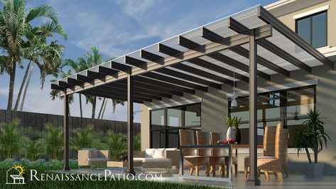 The Fresco Patio Cover System is a first of its kind. Using extruded, standing seam, polycarbonate roofing panels, originally designed for commercial greenhouse applications, attached to our stunning Pergola framing system with custom designed extrusion, we have been able to create a patio roof that is not only stunning, but incredibly strong, strong enough to resist up to 175mph winds and high snow loads.  #Poliycarbonate #Pergola #PatioRoof #Tampa #Fortmyers #Naples #Florida  #Jacksonville Shade Trellis, Pergola Design, Aluminum Pergola, Deck With Pergola, Screened In Patio, Pergola With Roof, Patio Roof, Pergola Kits, Pergola Plans