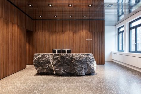 Froriep, law firm | Hürlemann Unique Reception Desks, Stone Reception Desk, Lobby Desks, Stone Wall Design, Reception Desk Design, Stone Counters, Reception Counter, Lighting Plan, Hotel Reception