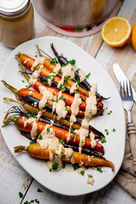 Heirloom Carrots, Roasted Rainbow Carrots, Lemon Tahini Sauce, Carrots Recipe, Rainbow Carrots, Tahini Sauce, Vegan Thanksgiving, Holiday Dining, Roasted Carrots