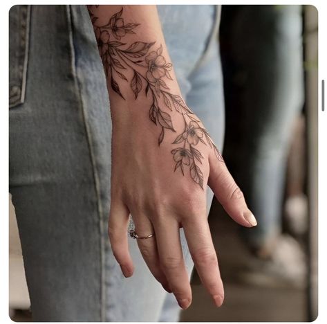 Fern Hand Tattoos For Women, Floral Wrap Arm Tattoo, Floral Inner Wrist Tattoo, Wrap Around Wrist Hand Tattoo, Hand Tattoo Plant, Fern Wrap Around Tattoo, Hand Vine Tattoo, Plant Hand Tattoo, Floral Hand Tattoos