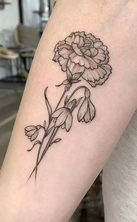 The Meanings Of Carnation Tattoos (Explained In Detail) Carnation And Snowdrop, Carnation Tattoos, Snowdrop Flower Tattoo, Flower Tattoo Meaning, Carnation Flower Tattoo, Carnation Tattoo, Snowdrop Flower, Bouquet Tattoo, Birth Flower Tattoos