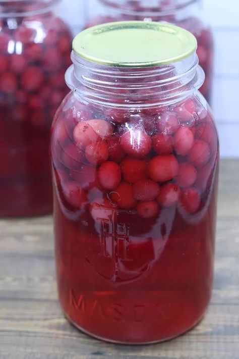 Canning cranberry juice with whole cranberries is an incredibly easy way to make homemade cranberry juice. This makes a delicious juice that you drink plain or use in recipes or to make mixed drinks.
 
Canning whole cranberries for juice is my preferred way to make homemade cranberry juice. Store bought juice is full of sugars and sometimes even high fructose corn syrup.Yes, this cranberry juice recipe for canning does have sugar, but it's necessary to extract the juice from the berrie… Cranberry Drink Recipes, Canning Cranberry Juice, Canning Cranberry, Cooking Cranberries, Cranberry Drinks, Canned Cranberries, Baked Apple Recipes, Canned Juice, Cut Recipe