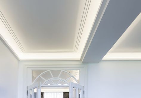 Introducing a coffered ceiling is a great way to reimagine a plain interior by adding a statement décor. It is also a perfect solution to introduce ambient lighting into any room. Our mouldings help to achieve this quickly and effortlessly. Visit our online store to see our coving range or call us for advice. Coffered Ceiling Led Lighting, Coving With Lighting, Ceiling Coving Lighting, Cove Ceiling Lighting, Cornice Lighting, Coffered Ceiling Lighting, Molding Lighting, Coving Lighting, Coffered Ceiling Ideas