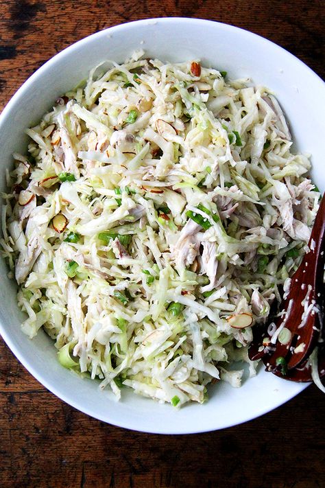 Chicken and Cabbage Salad with Sesame Seeds, Scallions and Almonds - this one is inspired by the sumi salad at the Honest Weight Food Coop in Albany. Salting the cabbage, a trick I learned from the Slanted Door cookbook, makes all the difference in the world. Add chicken makes it a meal. Chicken Cabbage Salad, Healthy Coleslaw Recipes, Vietnamese Chicken Salad, Chicken Cabbage, Healthy Coleslaw, Cabbage Salad Recipes, Tofu Salad, Chicken And Cabbage, Poached Chicken