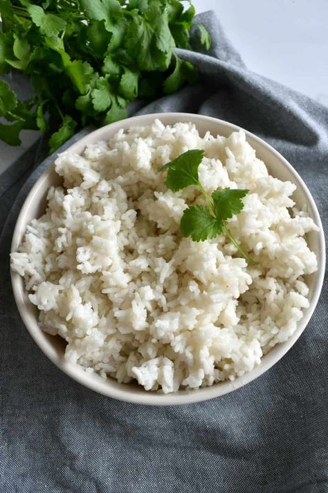 Perfect Fluffy Thai Coconut Rice (Stovetop method) - Hint of Healthy Coconut Garlic Rice, Thai Jasmine Rice Recipes, Coconut Jasmine Rice Recipes, Thai Sweet Rice Recipe, Healthy Coconut Rice, Thai Rice Recipes, Thai Side Dishes, Thai Coconut Rice, Garlic Rice Recipes