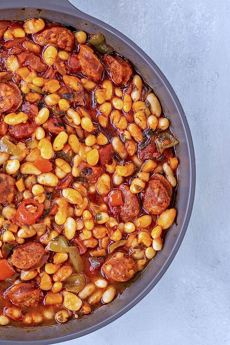 This Spanish white bean stew is a great way to eat your beans! The chorizo makes it extra warm and cozy, perfect for a weeknight dinner. #Spanish #Mediterranean #beans #stew #chorizo #sausage #gluten-free #legumes Mediterranean Beans, Beans Stew, White Bean Stew, Chorizo Recipes, Spanish Mediterranean, Chorizo Sausage, Spanish Dishes, Bean Stew, White Bean