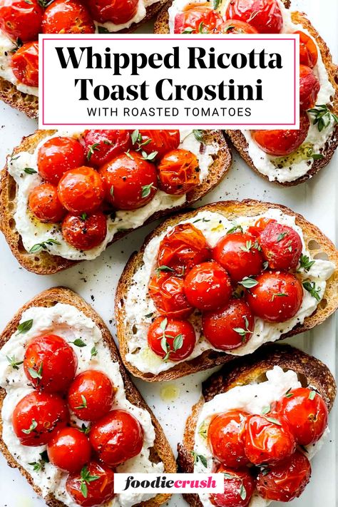 This Whipped Ricotta Toast Crostini with Roasted Tomatoes recipe is the perfect appetizer for any occasion!  Creamy ricotta cheese is seasoned and whipped, then spread on toasted slices of bread.  Tangy, oven-roasted tomatoes add a pop of flavor and color, making this a simple yet impressive dish that's ready in under 30 minutes. Whipped Ricotta With Roasted Tomatoes, Whipped Ricotta And Roasted Tomatoes, Ricotta Toast Ideas, Roasted Strawberry Whipped Ricotta Toast, Roasted Tomato Toast, Toast With Ricotta Cheese, Whipped Ricotta Bruschetta, Spread Recipes For Bread, Toasted Bread Recipes