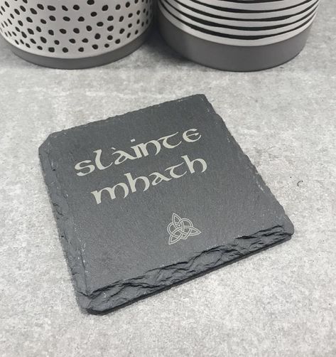 Beautiful Outlander inspired slate coaster. Slainte Mhath - Cheers! Irish Pub Basement, Slainte Mhath, Pub Basement, Slate Coasters Ideas, Cead Mile Failte Sign Irish, Heart Slate Coasters, Scottish Quotes, Slate Coasters Engraved, Engraved Coasters