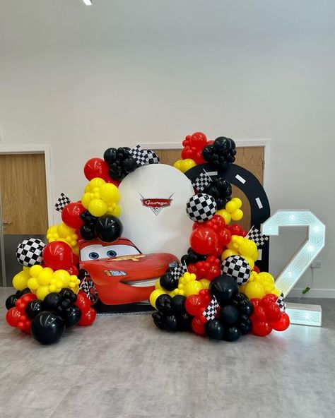 EVERY OCCASION EVENTS • BALLOON & EVENT STYLIST CHESHIRE on Instagram: "GEORGE’S 2nd BIRTHDAY 🚗 A Cars inspired display for George’s 2nd birthday complete with picnic for 16 children. What theme would your child choose? #carsparty #lighteningmcqueen #birthdayparty #2ndbirthday #kidspartydecor #disneycars #kidspartyballoons @kalisanballoons @kalisanuk @balloon_world_nwgreetings_uk" Cars Theme Balloon Decoration, Cars Backdrop Ideas, Cars Birthday Balloons, Mcqueen Balloon Decor, Lightning Mcqueen Balloon Arch, Car Theme Balloon Decoration, Car Theme Birthday Decor, Cars Balloon Garland, Cars Decorations Party