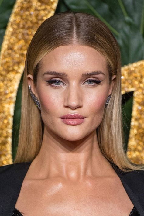 Dark Blonde Hair Colours: Caramel Roots, Highlighted Tips And More | Glamour UK Dark Suede Blonde, Dark Blonde Hair Celebrities, Dark Blonde Celebrities, Makeup For Dark Blonde Hair, Rosie Huntington Whiteley Hair Short, Rose Huntington Whiteley Hair, Dark Brows With Blonde Hair, Blonde Hair For Green Eyes, Dark Blonde Hair Green Eyes