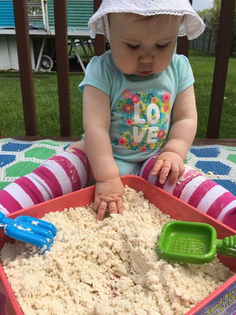 These days, at 10 months old, Baby Bear is quite the busy body. Always wanting to get into things she’s not supposed to. Especially the dirt when we are outside! We’ve already ruined a few pairs of pants in the garden this year. I thought I would incorporate this love for digging into a fun, [...] Edible Sensory, Edible Sensory Play, Baby Sensory Play, Cloud Dough, Baby Play Activities, Baby Sleep Problems, Toddler Play, Toddler Fun, Baby Sensory