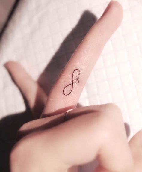 Infinity finger tattoo by @wittybutton_tattoo Always And Forever Finger Tattoo, Infinity Tattoo On Ring Finger, Infinity Ring Finger Tattoo, Inner Ring Finger Tattoo, S Infinity Tattoo, Infinity Hand Tattoo, Tiny Infinity Tattoos For Women, Infinity Small Tattoo, I Love You Infinity Tattoo