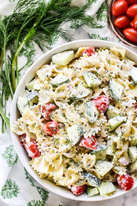 Switch up your side dish game with this creamy Cucumber Pasta Salad! Loaded with garden cucumbers, fresh tomatoes, and a creamy lemon dill dressing, it's the perfect side salad for all your summer meals! Garden Cucumbers, Cucumber Pasta, Macaroni Salads, Cucumber Pasta Salad, Salad Appetizer Cups, Resep Pasta, Side Salads, Dill Dressing, Resep Salad