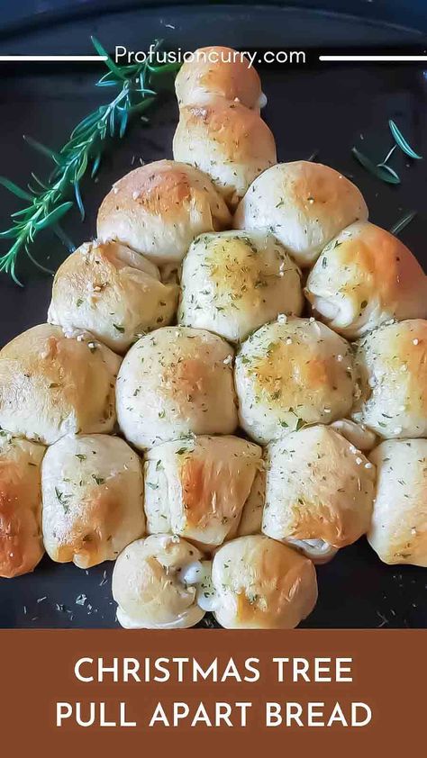 Christmas Tree Pull-Apart Bread using crescent rolls is a festive and visually appealing holiday appetizer or side dish. It's made by arranging crescent roll dough in the shape of a Christmas tree and filling it with delicious ingredients. Pull Apart Christmas Tree Crescent Rolls, Pull Apart Christmas Tree Bread Crescent Rolls, Holiday Nog Pull Apart Bread, Easy Christmas Tree Pull Apart Bread, Pull Apart Christmas Tree Bread Pillsbury, Christmas Tree Pull Apart Bread, Plain Bread, Easy Christmas Treats, Air Fried Food