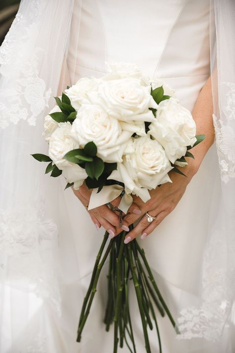 Classic white rose wedding bouquet with long stems worn by bride with rounded pink nails | Weddings By Nicola and Glen Manor House Castle Combe, Long Stem Bouquet, White Rose Wedding, Classic Wedding Bouquet, White Rose Wedding Bouquet, House Castle, Strapless Wedding Dress Mermaid, White Rose Bouquet, The Manor House