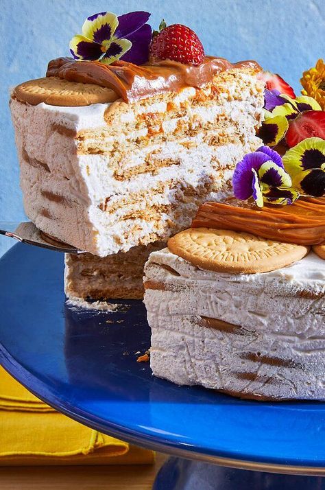 Toasty, slightly sweet Maria cookies were an after-school snack staple for Velez while growing up in The Bronx—here, she transforms those beloved cookies into an icebox cake, layered with a sweetly spiced cream filling, topped with luscious dulce de leche, and festooned with strawberries and flowers.#desserts #recipes #foodandwine Cookie Icebox Cake, Maria Cookies, Icebox Cakes, Icebox Desserts, Julia Childs, Strawberry Icebox Cake, Icebox Cake Recipes, Cookie Cake Recipe, Refreshing Desserts