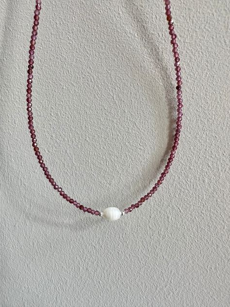 "Handmade natural garnet faceted crystal beaded necklace, 2mm beads, with a tiny freshwater pearl and sterling silver lobster clasp Necklace length approximately - 41 cm / 16\" Keep away from water. Avoid direct contact with perfumes and chemicals. Remove before showering or swimming." Tiny Pearl Jewelry, Pearl And Gemstone Necklace, Crystal Beads Necklace, Adjustable Handmade Red Pearl Necklace, Garnet Bead Necklace, Garnet Beaded Necklace, Elegant Red Faceted Bead Pearl Necklace, Red Gemstone Necklace, Red Garnet Gemstone Beaded Necklace