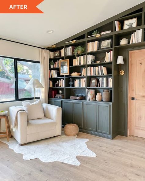 After: Room with green built-in bookshelf on one wall Tv Room With Bookshelves, Bookshelves With Nook, Vaulted Bookshelves, Movie Library Room, Emerald Green Built In Bookcase, Tall Library Wall, Built In Bookshelves Tv Wall, Living Room Designs With Bookshelves, Home Library Colors