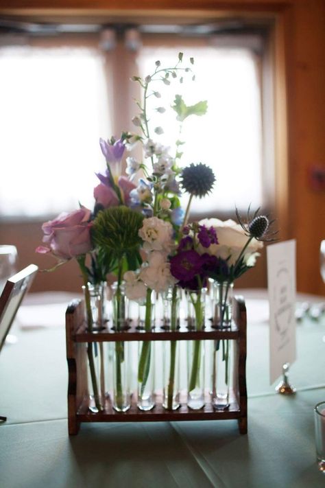 Wooden test tube racks-wedding centerpiece - boho flowers - for sale on poshmark! Science Wedding Centerpieces, Flower In Test Tube, Chemist Graduation Party, Test Tubes With Flowers, Flowers In Test Tubes, Test Tube Flower Arrangements, Propagation Centerpiece Wedding, Science Centerpieces, Chemistry Flowers