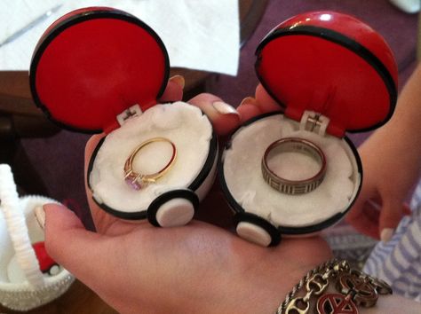 instead of a pillow, two pokeballs brought by the ring bearer Pokemon Ring, Video Game Wedding, Gamer Wedding, Nerd Wedding, Geeky Wedding, Nerdy Wedding, Anime Wedding, Geek Wedding, Pokemon Theme