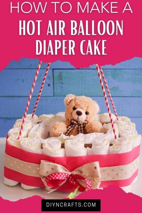 Follow this tutorial for a hot air balloon diaper cake with easy step by step video instructions for making your own baby shower gift! This diaper cake tutorial is an easy baby shower gift idea that also doubles as baby shower decor! Diaper Cake Tutorial Step By Step, Diy Diaper Cake Tutorial, Hot Air Balloon Diaper Cake, Small Diaper Cakes, Diaper Cake Tutorial, Easy Baby Shower Gift, Diaper Cakes Tutorial, Diaper Cake Instructions