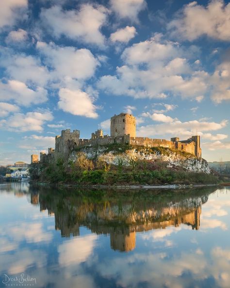 Visit Wales on Instagram: “🌤️ Pembroke Castle, idyllically set on the banks of the river estuary | @visitpembrokeshire 📸 @drewbphotography #FindYourEpic” Pembroke Castle Wales, Pembroke Castle, Visit Wales, Medieval Fortress, Honeymoon Ideas, The River, Banks, Wales, Places To Go