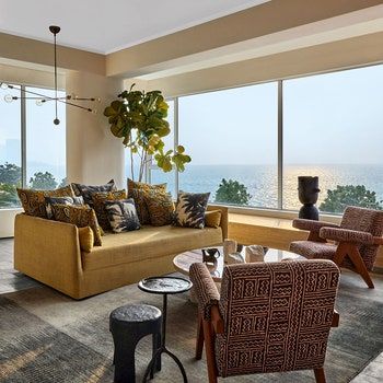 A Bangalore apartment brimming with Californian chic | Architectural Digest India Mumbai Apartment, Iron Stools, Indian Homes, Art Deco Home, Style Deco, Higher Design, London Design, A Living Room, Eclectic Home