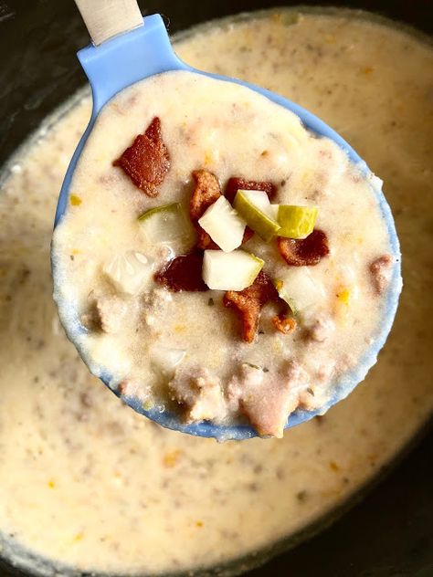 Crockpot Dill Pickle Bacon Cheeseburger Soup...everything you love in a bacon cheeseburger (including pickles!) in a creamy soup.  This simple soup cooks on low in the crockpot until you add a cheesy sauce to bring it all together.  A family favorite soup! Burger In A Bowl, Bacon Cheeseburger Dip, Dill Pickle Soup, Pickle Soup, Bacon Cheeseburger Soup, Simple Soup, Creamy Potato Soup, Cheeseburger Soup, Cheesy Sauce