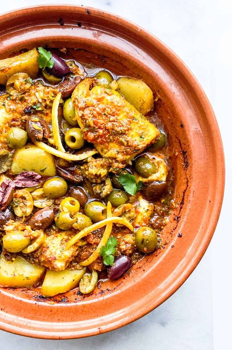 Fish Tagine with Chermoula Sauce - Feast with Safiya Fish Tagine Moroccan, Moroccan Fish Tajine, Moroccan Fish Tagine, Tagine Photography, Fish Tagine Recipes, Moroccan Lunch, Moroccan Fish Recipe, Moroccan Tagine Recipes, Moroccan Tajine