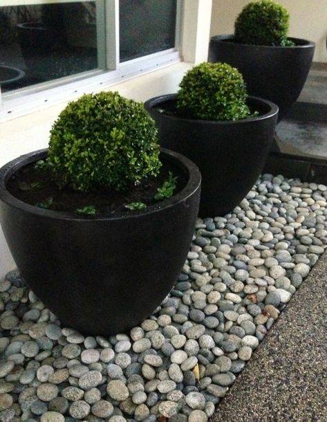 Landscape Ideas With Pots Planters, Garden Stone Mosaic, Garden With Rocks And Pots, Landscaping With Flower Pots Front Yards, Diy Landscape Rocks, Landscape With Pots Front Yard, Flower Bed With Rocks And Pots, Rock Landscaping With Potted Plants, Planters For Landscaping