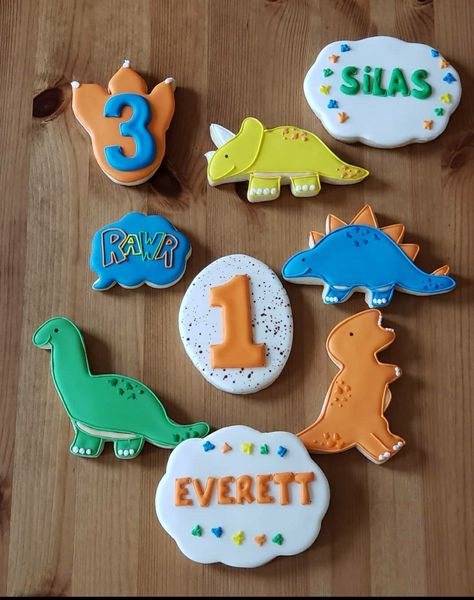 Dinosaur birthday cookies 1st Birthday Dinosaur Cookies, First Birthday Dinosaur Photoshoot, Decorating Dinosaur Cookies, Dinosaur Themed Cookies, Simple Dinosaur Cookies, Easy Dinosaur Cookies, Dinosaur Royal Iced Cookies, Dinosaur Party Cookies, Dinasour Cookies Decorated