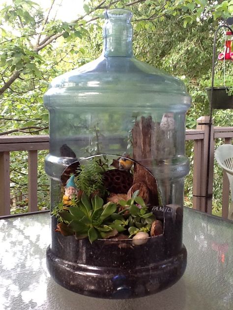 My Mothers Day gift I made from an old plastic water jug Diy Gallon Jug Ideas, Upcycle 5 Gallon Water Jug, Repurpose 5 Gallon Water Jugs, Water Jug Crafts, Water Jug Ideas, Decorated Water Jugs, Recycled Milk Jug Crafts, Bottle Greenhouse, Plastic Bottle Greenhouse