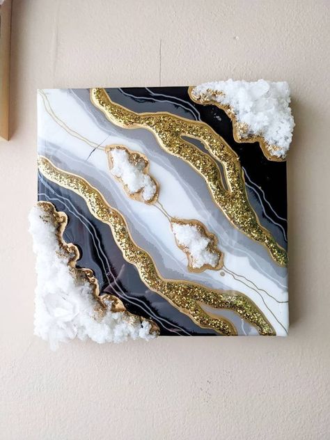 "8\"x8\" 1/2\" H This stylized geode is made in the resin art style!  Beautiful and one of a kind! This piece of wall art will add sparkle and class to any home!" Glitter Wall Art Living Room, Resins Ideas, Crystal Projects, Geode Canvas, White And Gold Resin, Geode Resin Art, Ocean Resin Art, Resin Art Canvas, Diy Resin Crystals