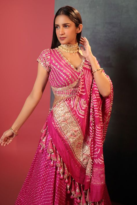 Buy Pink Silk Woven Bandhani V Neck Dotted Pattern Lehenga Set For Women by Bandhani Online at Aza Fashions. Anarkali Dress Bandhani, Pink Bandhani Lehenga, Bandhani Blouse Design Pattern, Bandini Blouses Designs, Embroidery On Bandhani, Bandhani Blouse Pattern, Bandhani Blouse Work, Bandhani Blouse Design, Bandhani Blouse